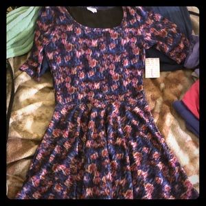Lularoe Nicole dress size large NWT. It would make a beautiful holiday dress.